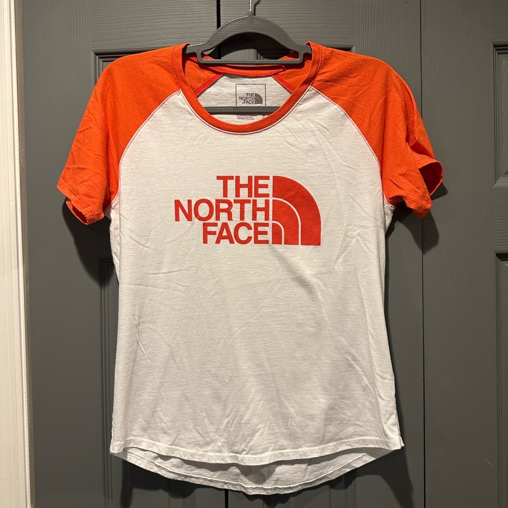 The North Face Women's Orange and White Short Sleeve Tee. Vintage